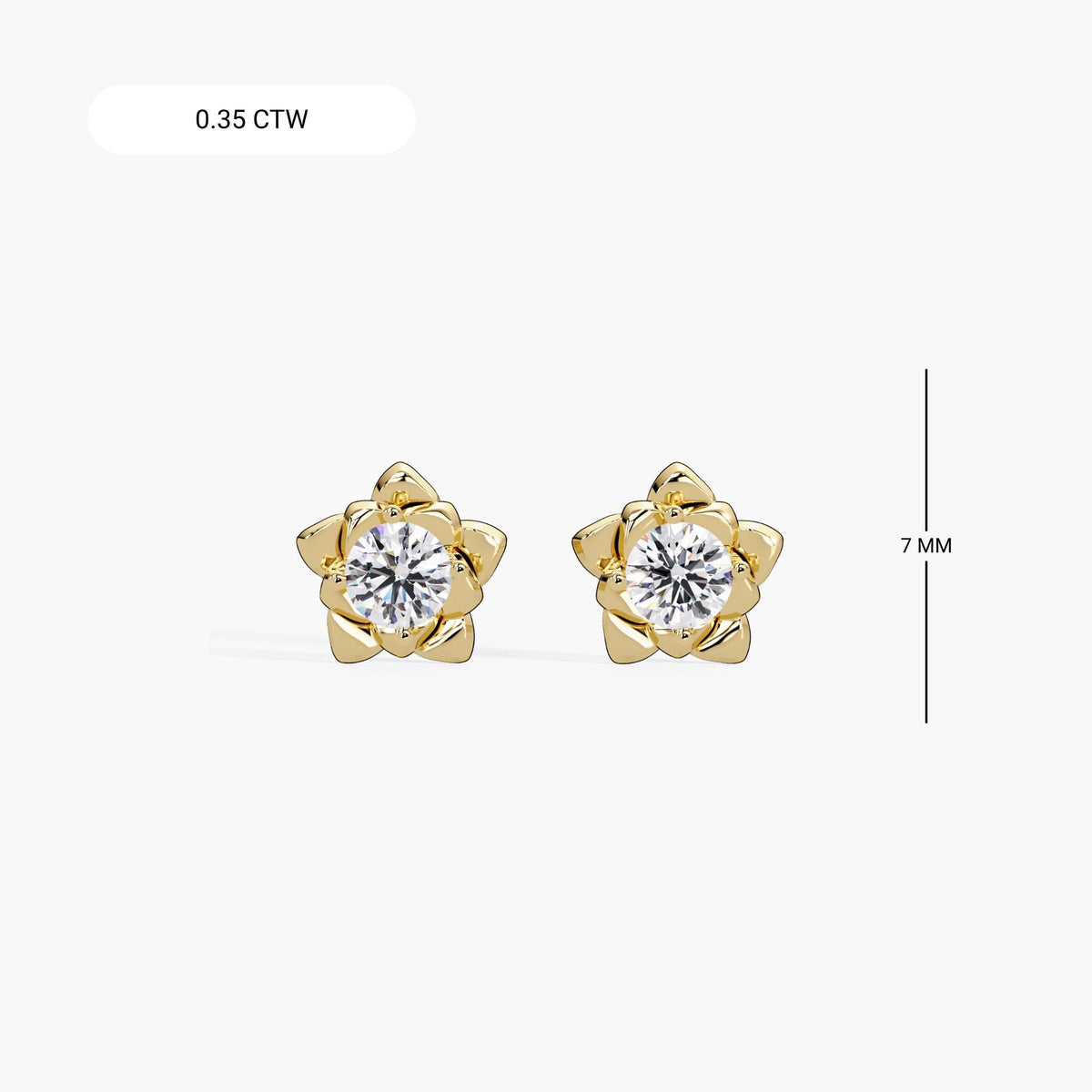 Floral diamond stud earrings in 14K yellow gold featuring round lab-grown diamonds set in a layered petal design. A gift for birthdays, weddings, or everyday wear. Perfect for weddings and summer style