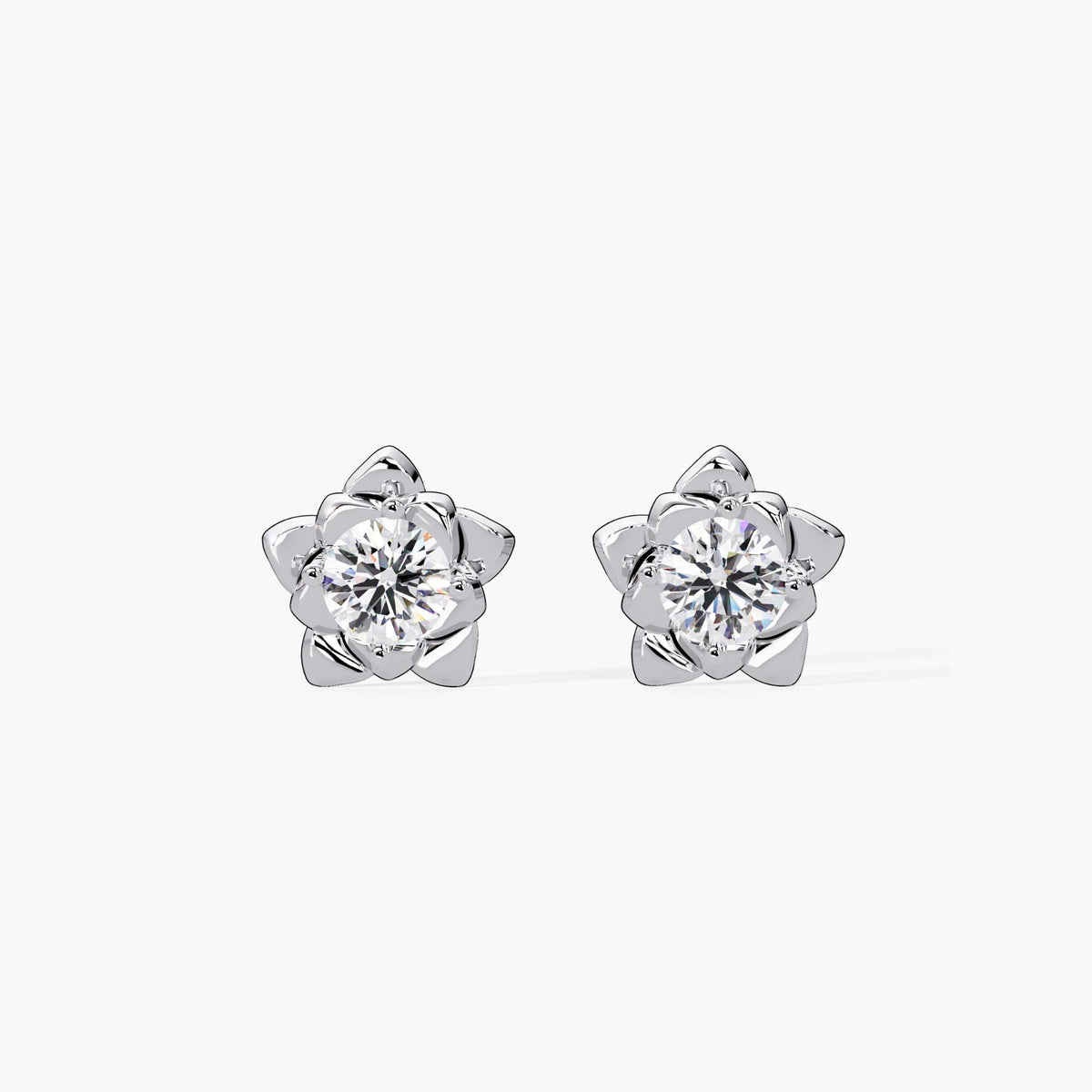 Floral diamond stud earrings in 14K white gold featuring round lab-grown diamonds set in a layered petal design. A gift for birthdays, weddings, or everyday wear. Perfect for weddings and summer style