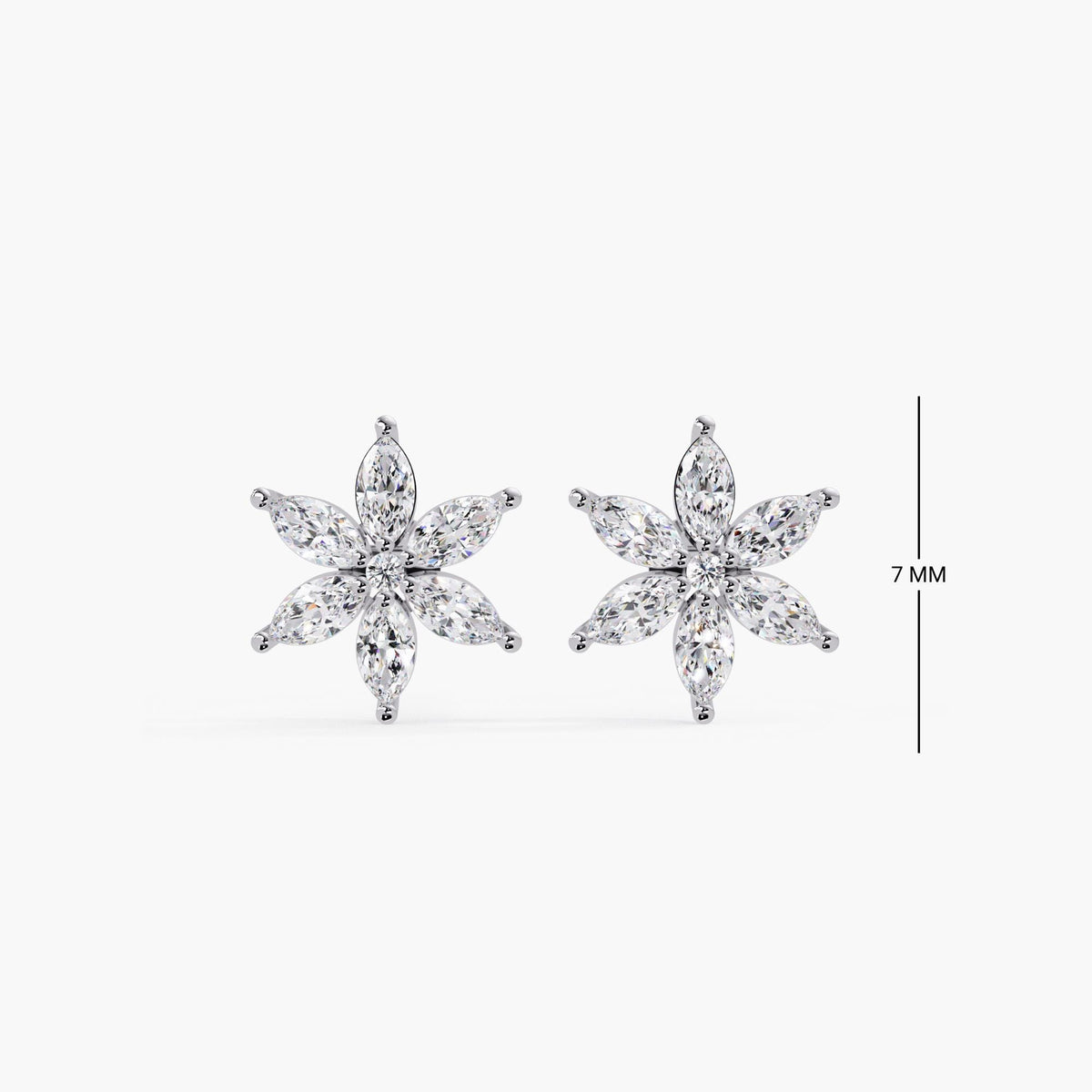 White gold marquise diamond flower stud earrings measuring 7mm in diameter, featuring six marquise-cut diamonds in a symmetrical floral cluster design