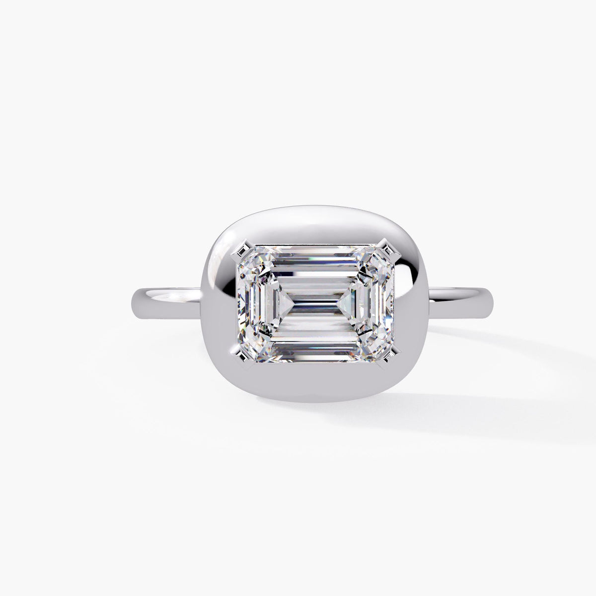 East-west emerald cut diamond bezel ring in 14K white gold with 1.60 carat IGI-certified lab diamond and a 2mm shank, bold dome design for modern engagement or statement wear. A meaningful gift for birthdays, anniversaries, or celebrating personal milestones.