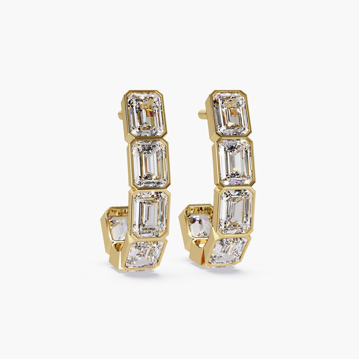 14K gold J-hoop earrings featuring five bezel-set emerald-cut lab-grown diamonds per hoop. The structured, geometric design adds a bold and modern edge to these statement huggie earrings.