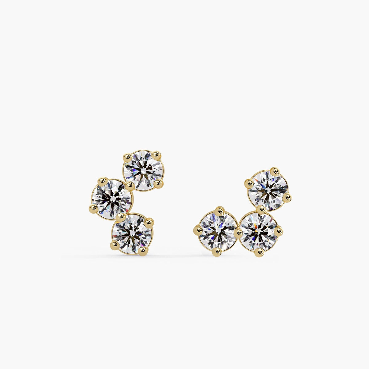 Three-stone cluster diamond stud earrings in 14K yellow gold, featuring round lab-grown diamonds in a delicate curved V-shape