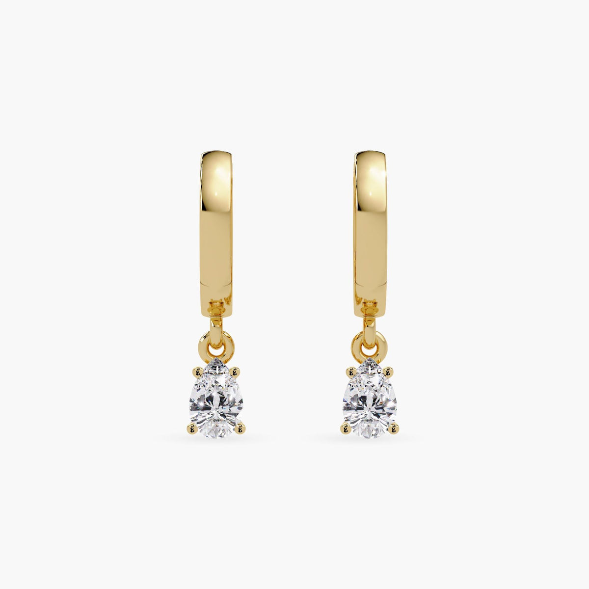 14K yellow gold huggie hoop earrings featuring pear-cut lab-grown diamond drops, prong-set. Lightweight and minimalist dangle design in 11mm or 14mm hoop size, intended for everyday wear, gifting, or stacking.
