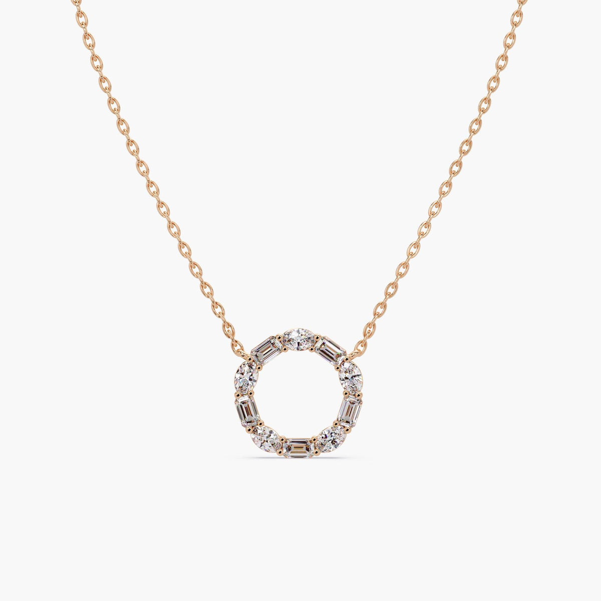 14K rose gold diamond circle necklace featuring alternating lab-grown emerald and oval diamonds in a 20mm open circle pendant design.