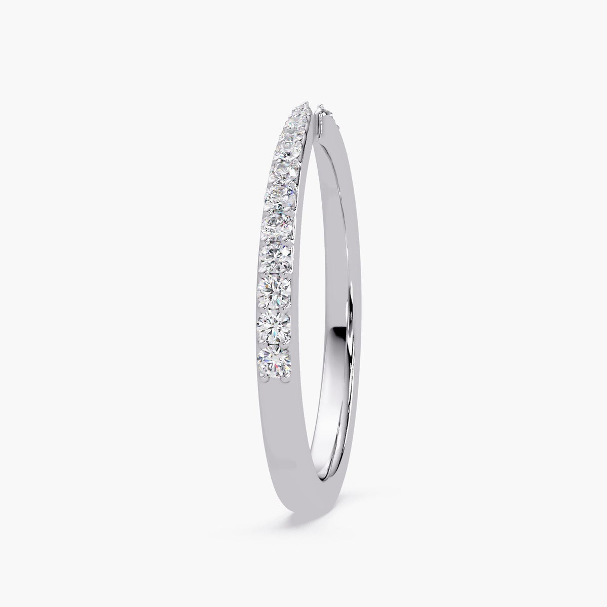 14K white gold diamond open band ring shown from angled view, featuring natural round pavé-set diamonds in a slim cuff silhouette, elegant fine jewelry design ideal as a minimalist wedding band, stacking ring, or timeless anniversary gift for her.