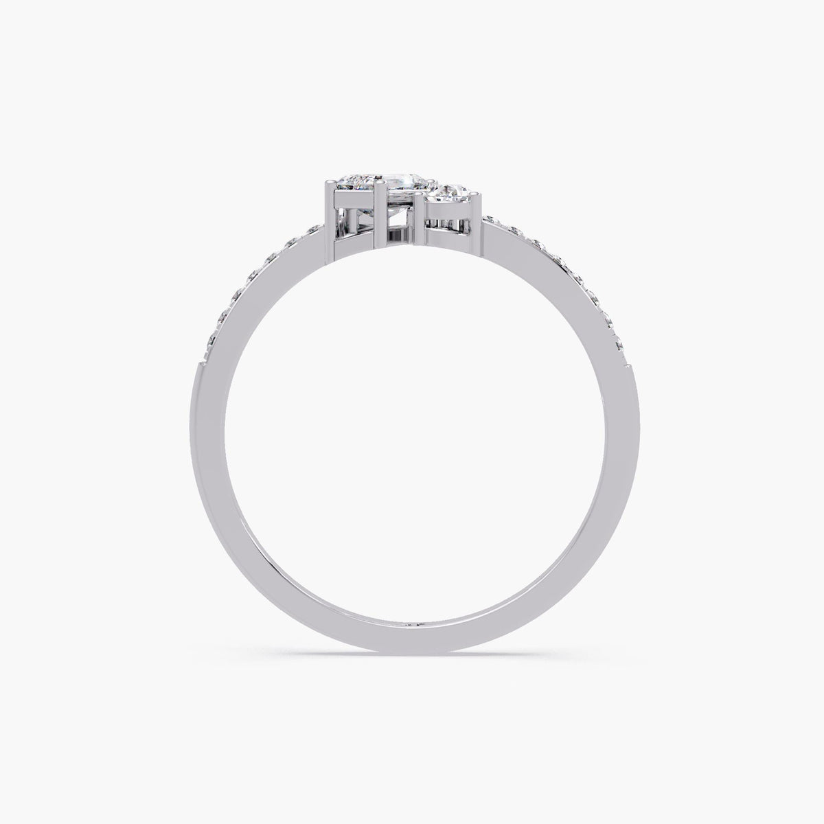 14K white gold toi et moi ring featuring emerald cut and pear cut lab diamonds on a slim pavé diamond band, modern two stone bypass design