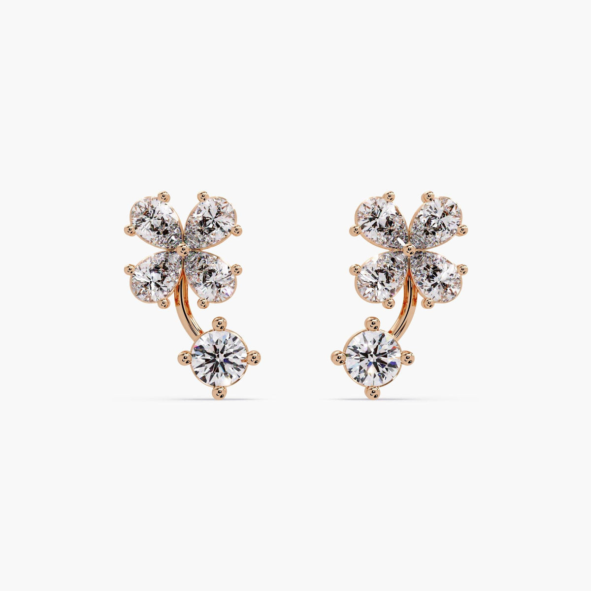 14K rose gold clover earrings featuring four pear-cut lab-grown diamonds in a floral cluster with a prong-set round diamond drop. Warm rose gold setting enhances brilliance, creating an elegant nature-inspired stud design.