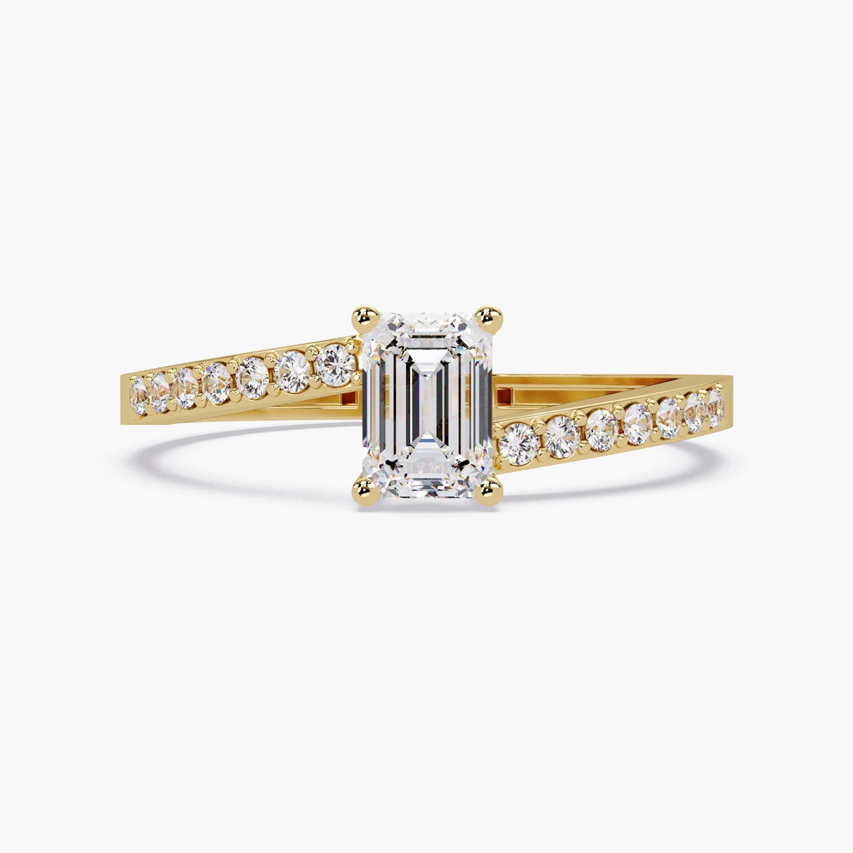 Emerald cut diamond engagement ring with 0.50 ct center stone, 14K yellow gold four prong setting and pavé band, dainty solitaire design.