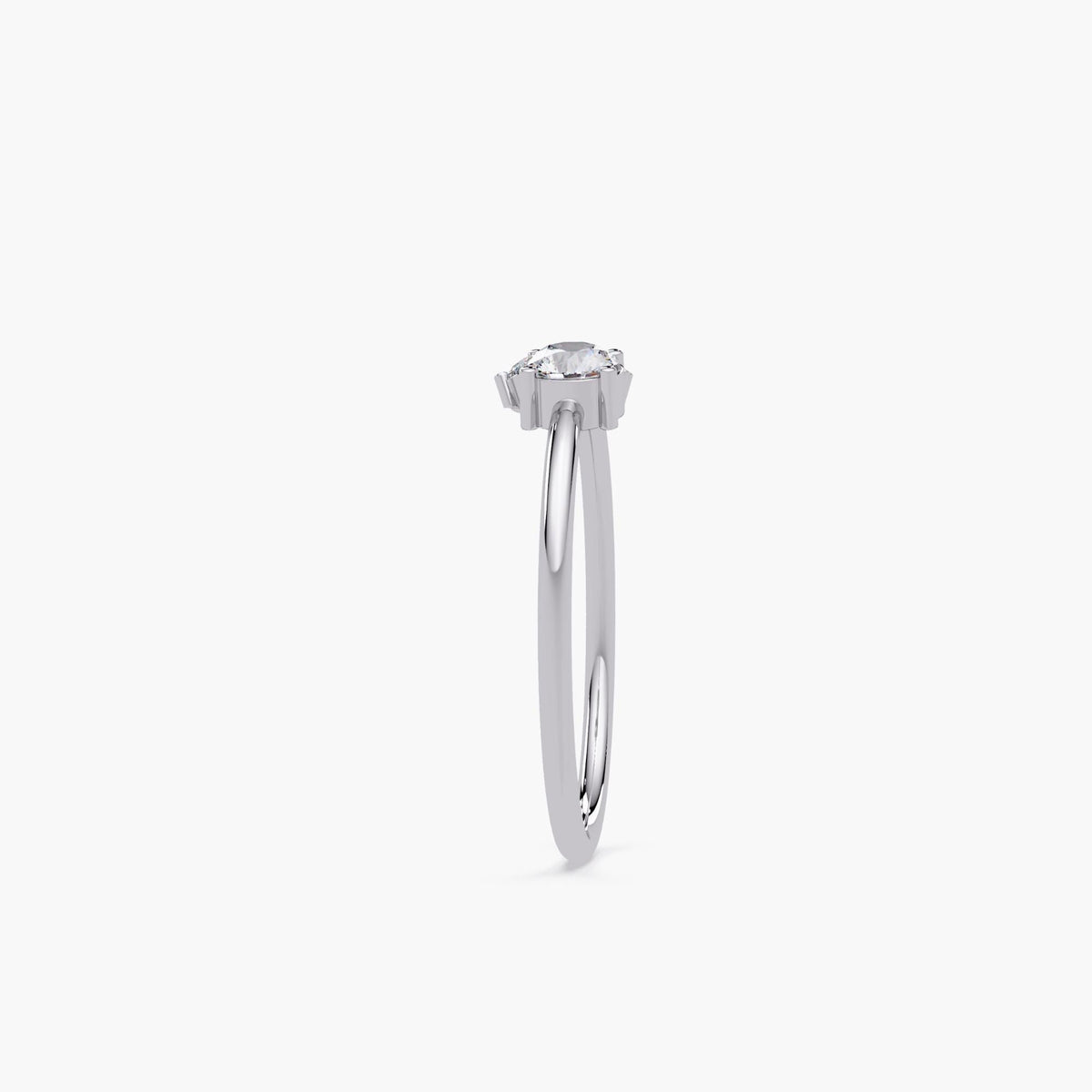 14k white gold three-stone lab diamond ring with slim polished band and elevated cluster setting, showing height and structure