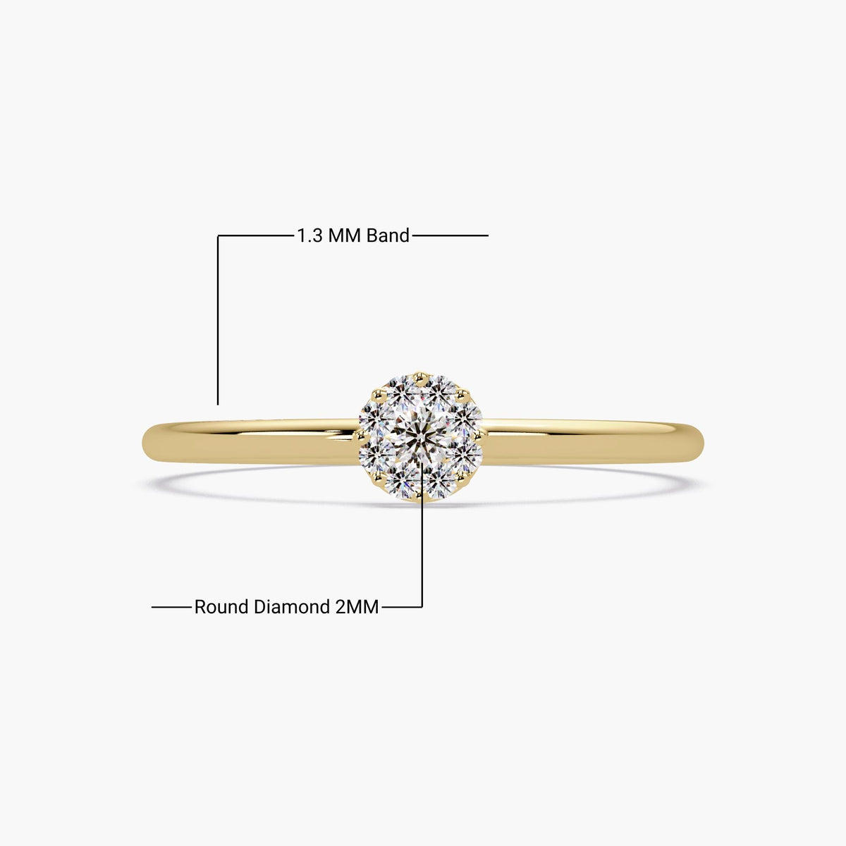 This is a dainty 14K gold solitaire-style ring with a round diamond cluster centerpiece.