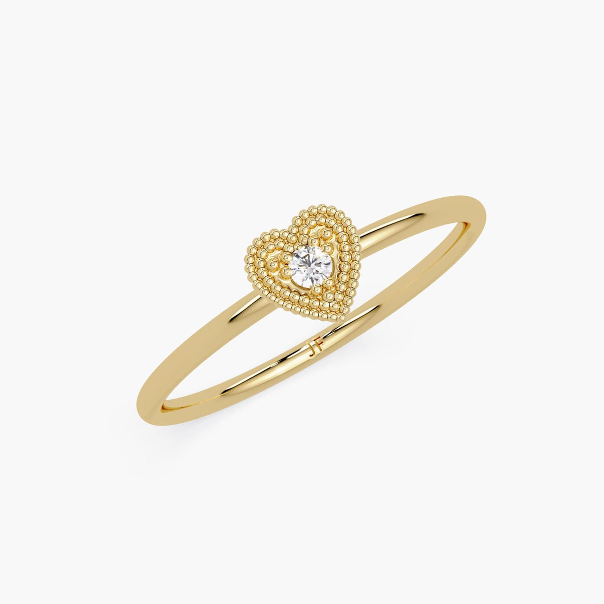 A minimalist promise ring made of 14k yellow gold with a delicate heart design and a natural diamond accent.