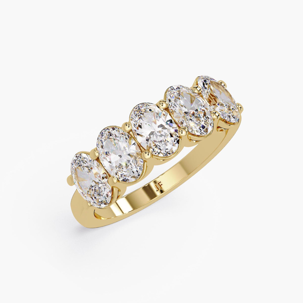14K yellow gold half eternity band with five oval lab-grown diamonds, showcasing brilliant sparkle and secure prong setting