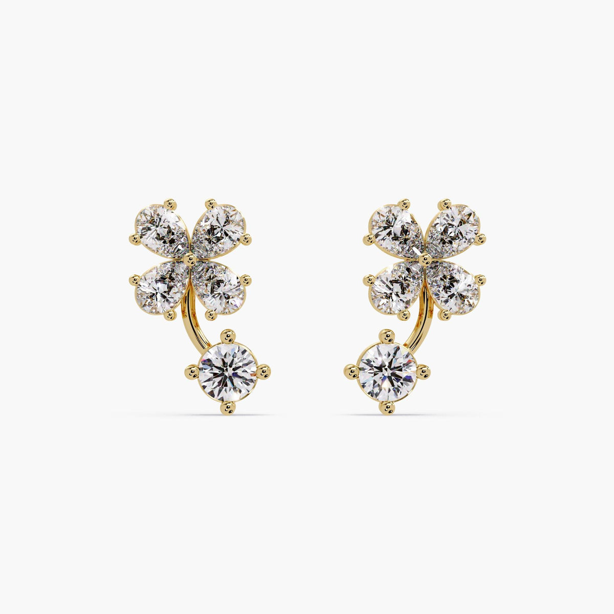 14K Gold Diamond Clover Earrings featuring a floral cluster of pear and round lab-grown diamonds. Unique curved design hugs the ear, perfect as sculptural statement studs or wedding guest jewelry. Ideal gift for wife, daughter, or minimalist fine jewelry lovers.