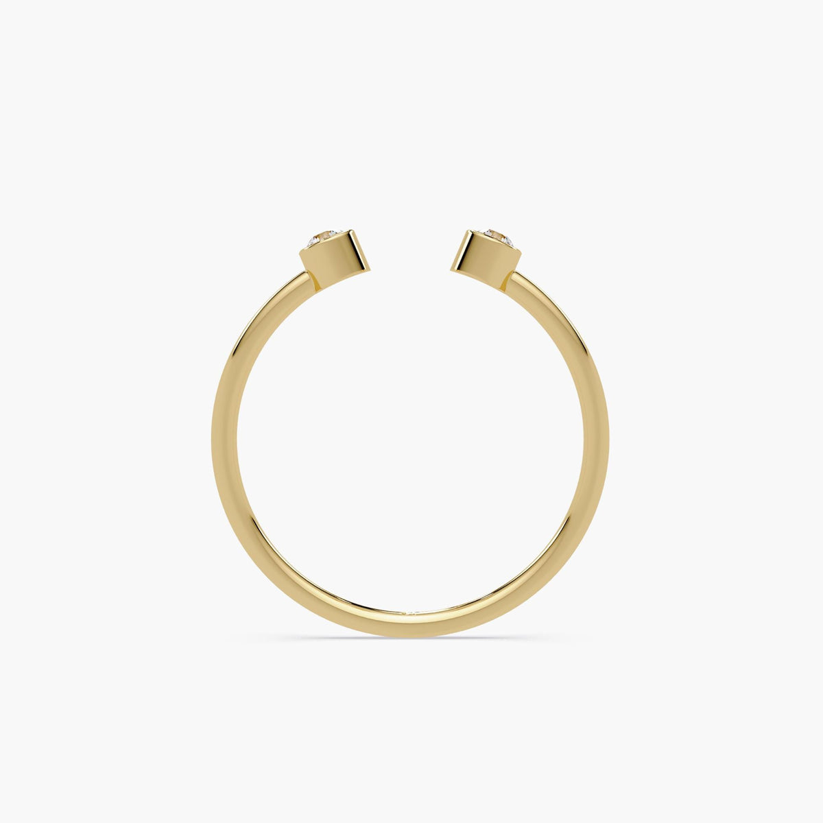 14k yellow gold open cuff ring with two bezel set natural diamonds.
