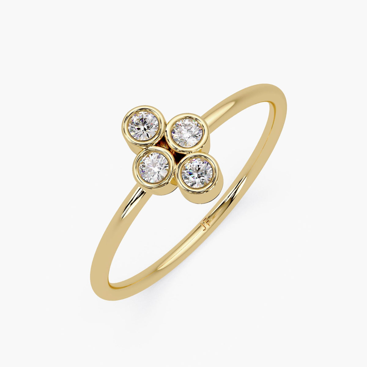 14k yellow gold four stone diamond ring with bezel set natural diamonds.