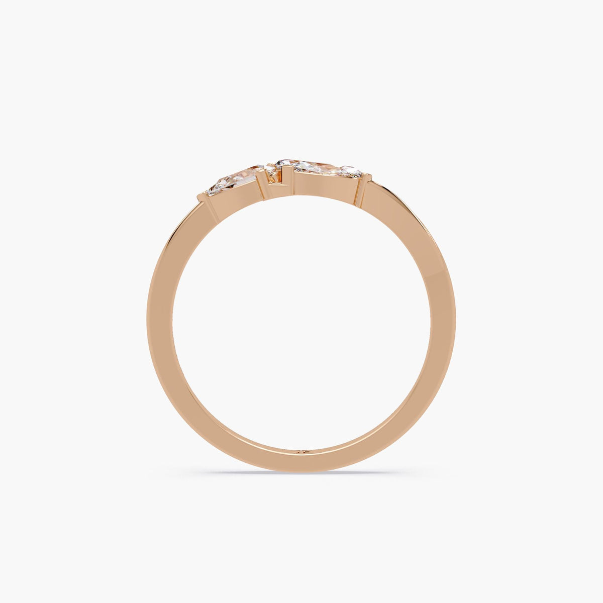 4K rose gold ring featuring a floral-inspired arrangement of one pear-cut and two marquise-cut lab-grown diamonds in an open band design; sleek, polished band with subtle height at the setting area