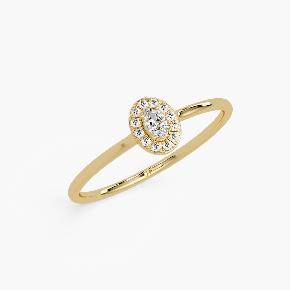 dainty oval-cut diamond halo ring in 14K yellow gold, lab-grown diamond stacking or promise ring with sparkle