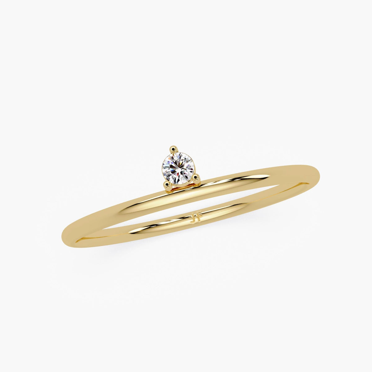 Dainty solid gold band featuring one round natural diamond, minimalist ring design