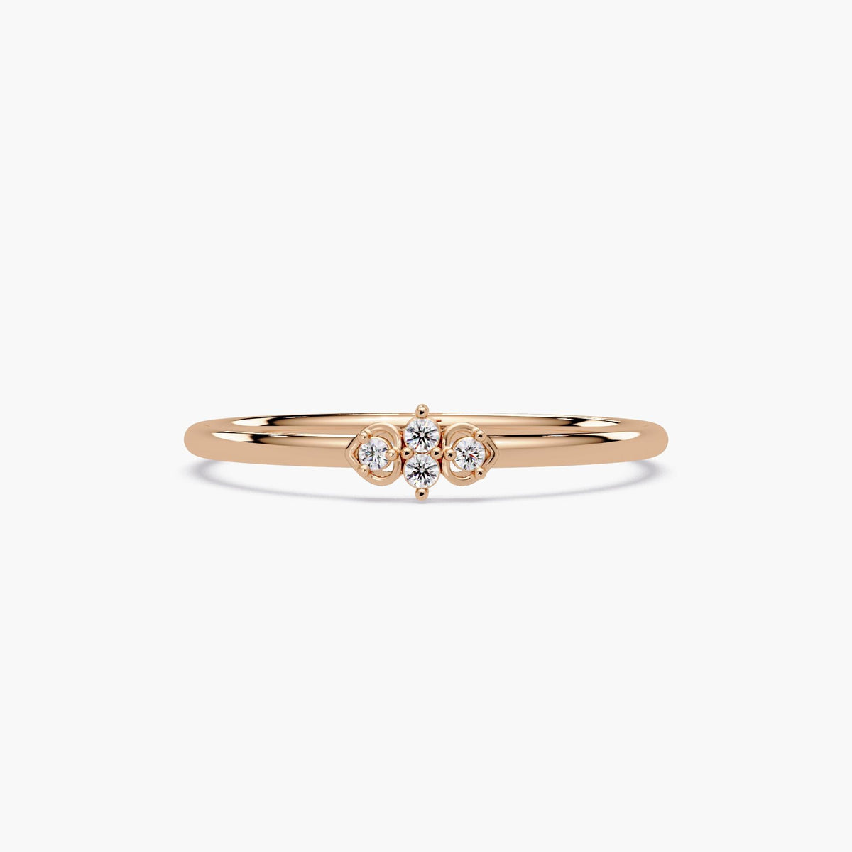 Minimalist 14k gold band featuring a heart-shaped diamond arrangement.