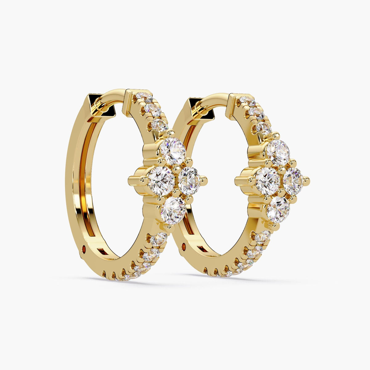 14K yellow gold hoop earrings on a white background, featuring a floral or clover-shaped cluster of lab-grown diamonds at the front.