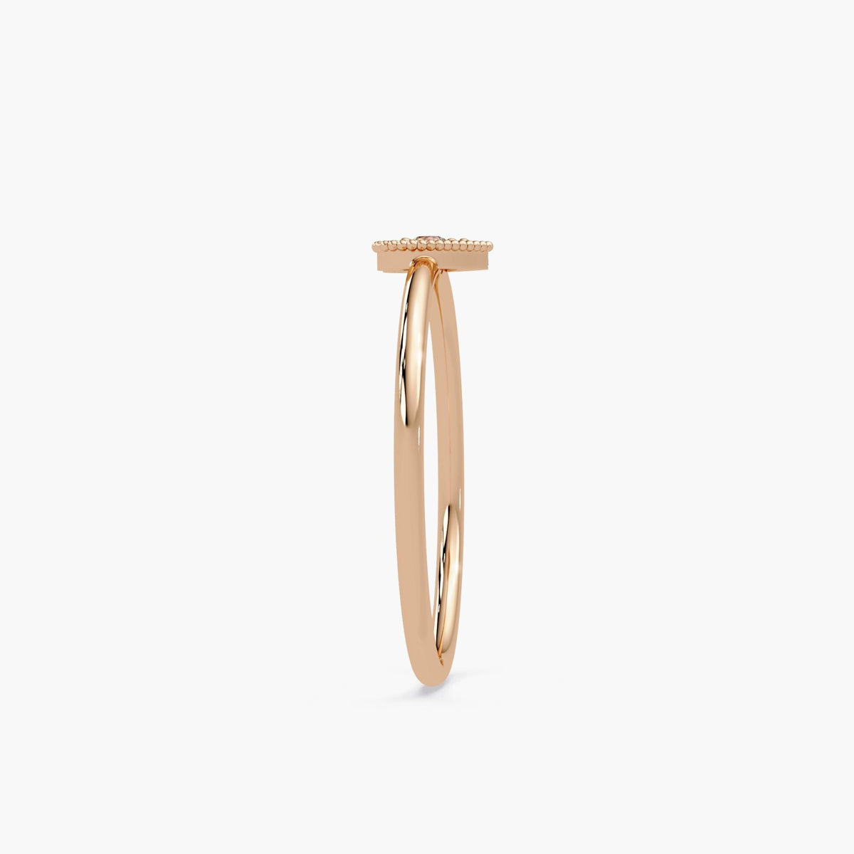 A romantic gold stacking ring with a diamond heart centerpiece, perfect for everyday wear or special occasions.