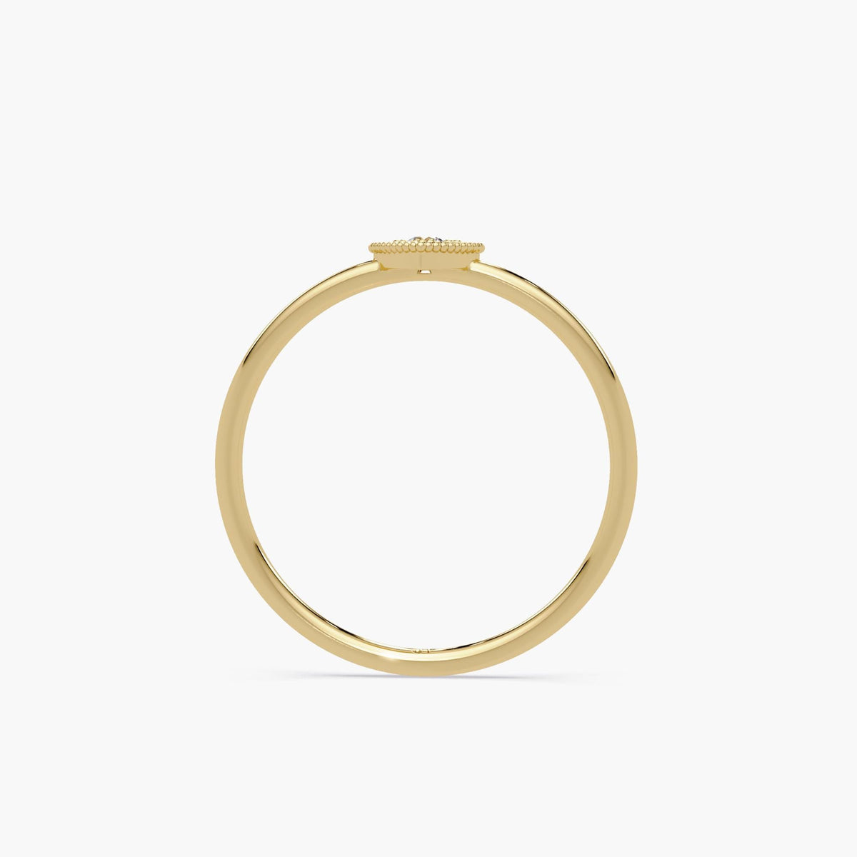 A 14k yellow gold stacking ring with a diamond heart centerpiece, perfect for everyday wear or special occasions.
