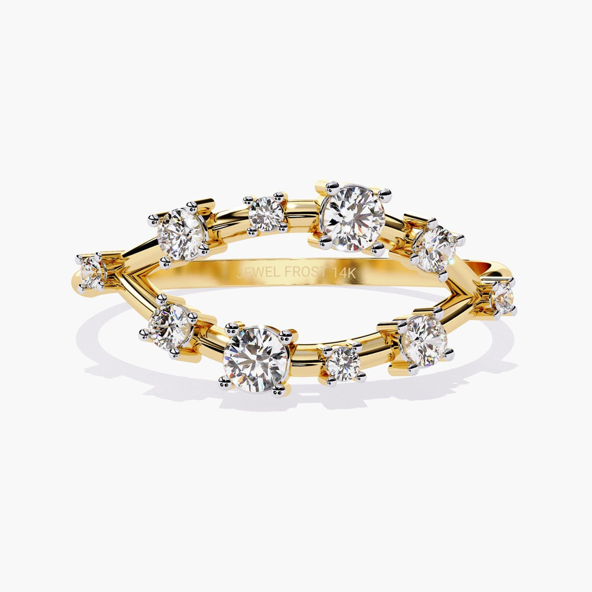 A yellow gold band with alternating round-cut diamonds set in a delicate open-band arrangement.