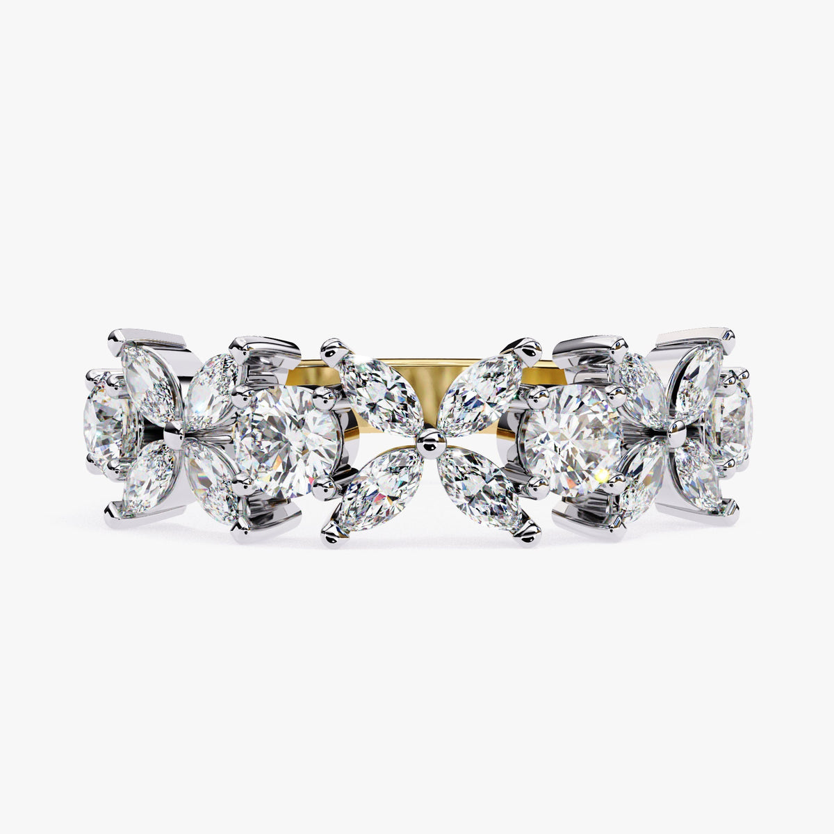 May include: A white gold and yellow gold ring with a floral design. The ring is set with round and marquise shaped diamonds.