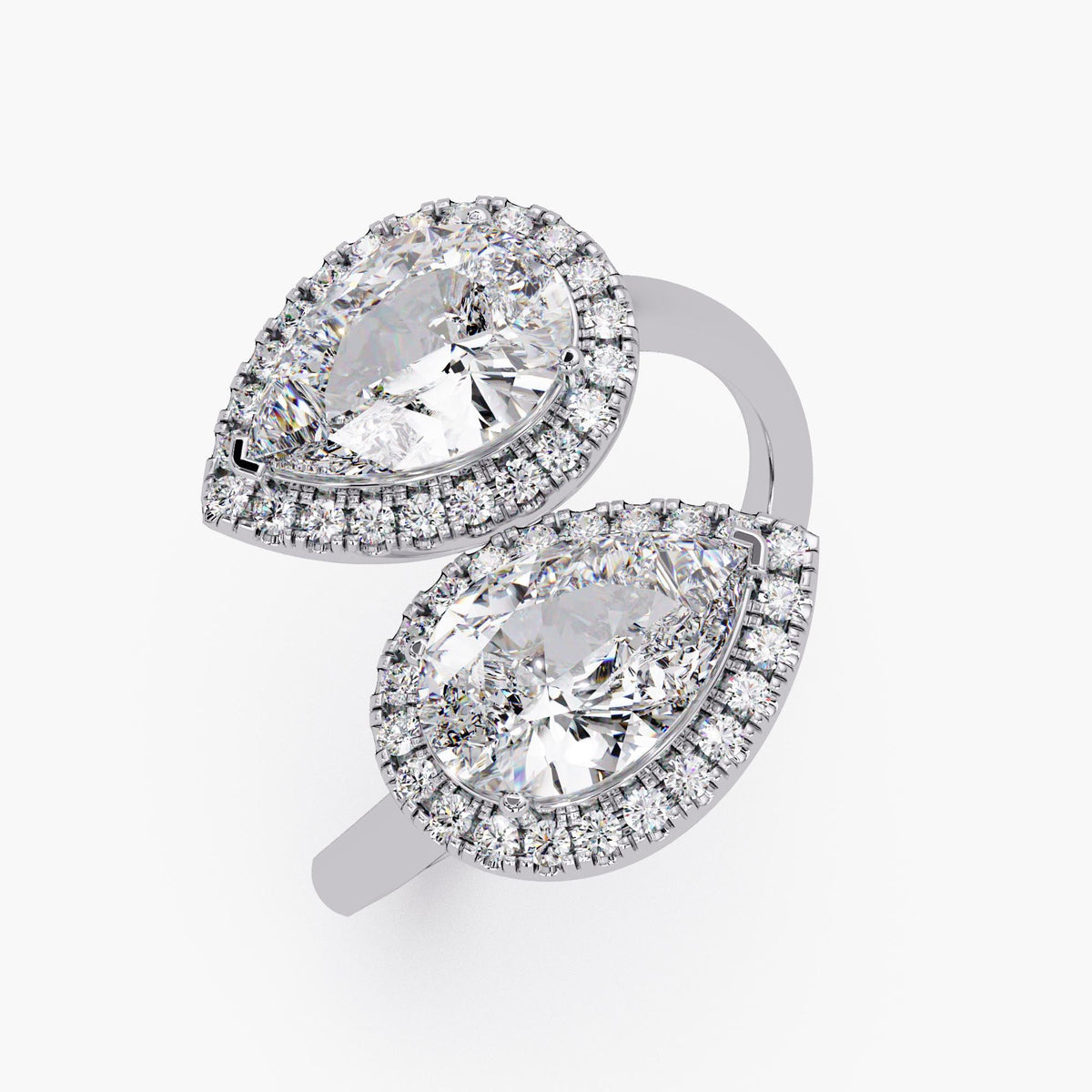 white gold double pear-shaped lab diamond ring with pavé halos in a bypass Moi et Toi design, featuring IGI-certified stones.