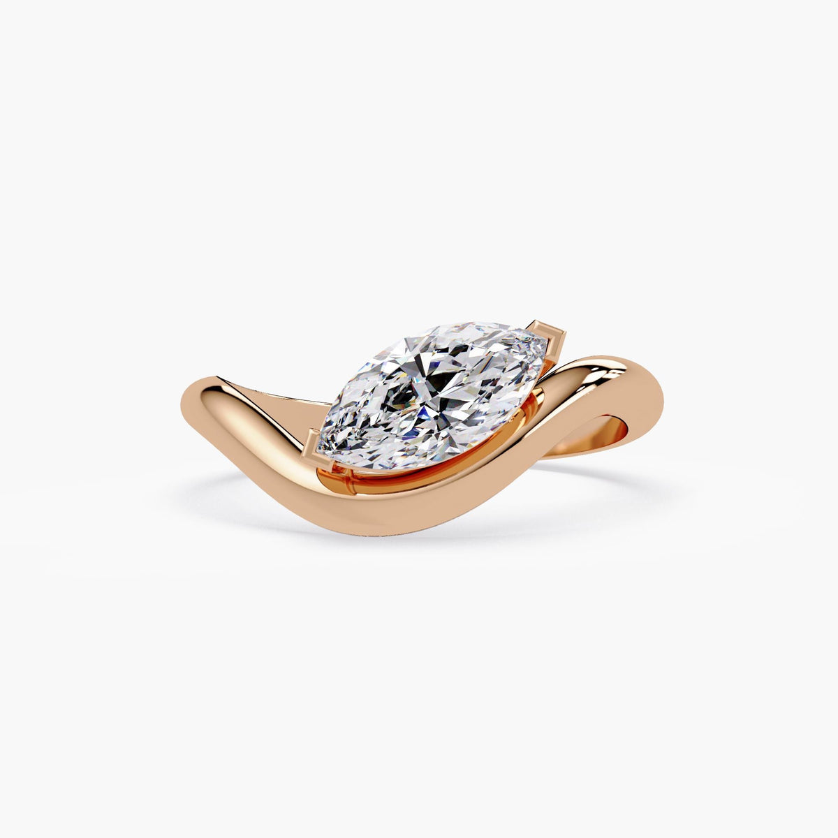 14K rose gold ring featuring a 0.75 carat marquise-cut lab grown diamond in a modern bypass setting, showcasing a fluid east-west design with a high-polish finish.