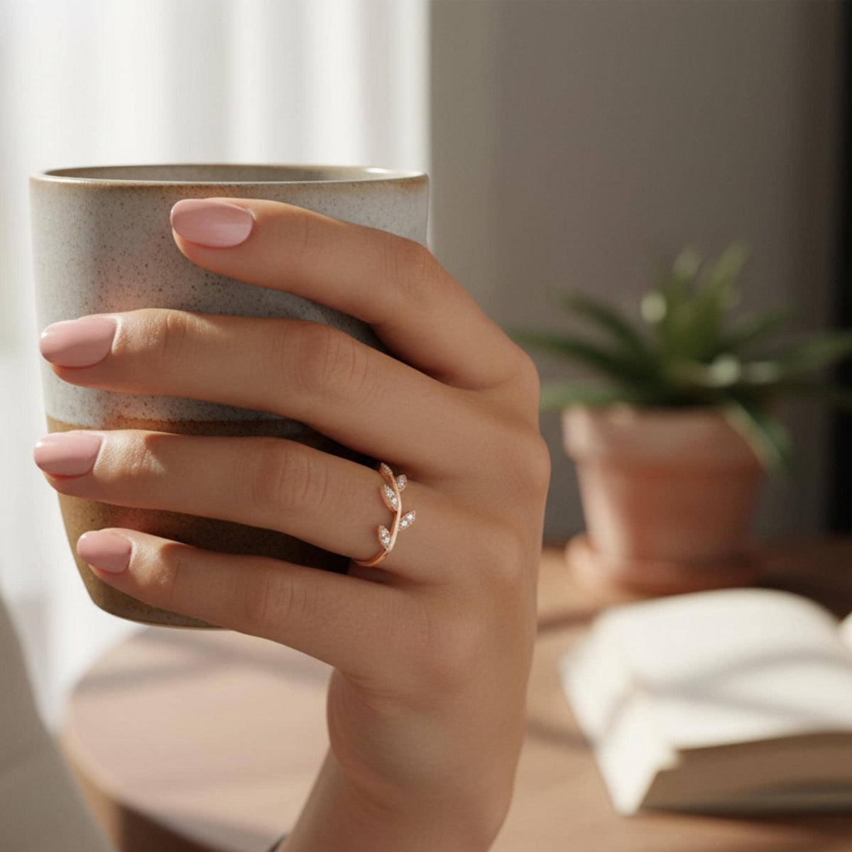 Fine jewelry gold ring with diamond leaf details and delicate band
