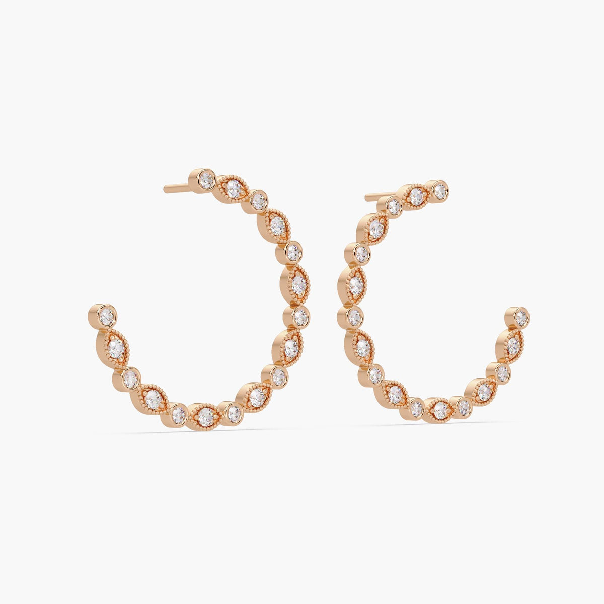 Diamond hoop earrings with elegant alternating design.