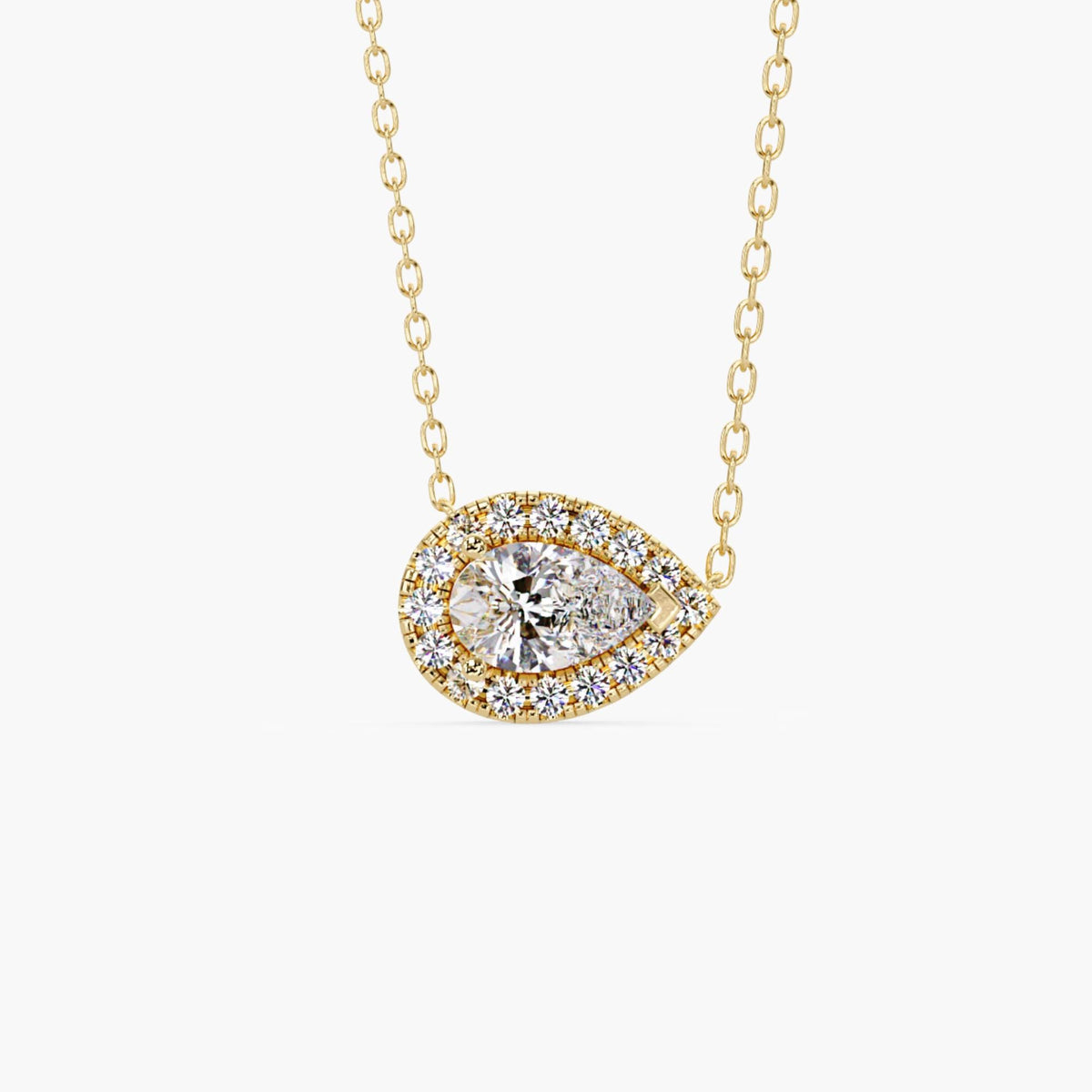 14k gold pear diamond pendant with a 1ct lab grown pear-shaped center diamond surrounded by a halo of round diamonds in an east west setting.