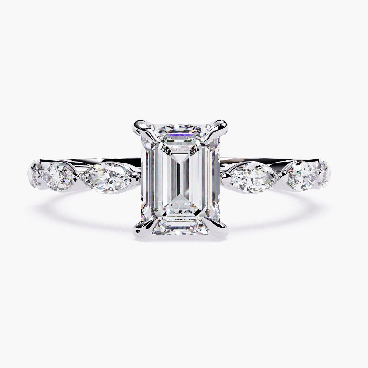 A gold emerald-cut moissanite engagement ring. The ring features a large, radiant emerald-cut moissanite center stone.