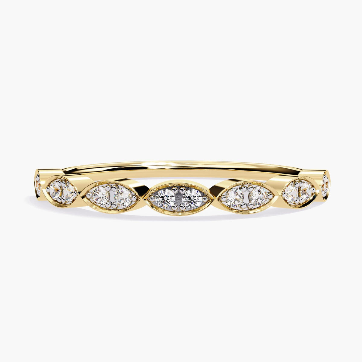 A yellow gold marquise wedding band featuring 14 round natural diamonds, each set in a bezel pave setting. The diamonds are arranged in an elegant marquise pattern along the band, adding a touch of sophistication. The 14K gold band is 2.2mm wide, offering a sleek and modern look. This dainty half eternity ring is perfect as a wedding band, promise ring, or anniversary gift, showcasing timeless beauty with its clean, minimalist design.