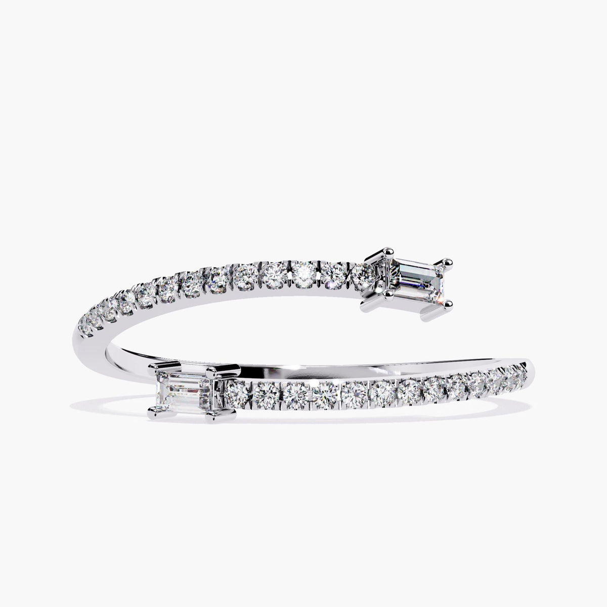 Front view of a 14k white gold bypass ring with round diamonds pavé-set along the band and horizontally set baguette diamonds at each open end.
Can be styled as a standalone piece or stacked with slim bands for a layered look.
Suitable for daily wear, gifting, or stacking.
Design follows a clean, linear silhouette with contrast between baguette and round cuts.
