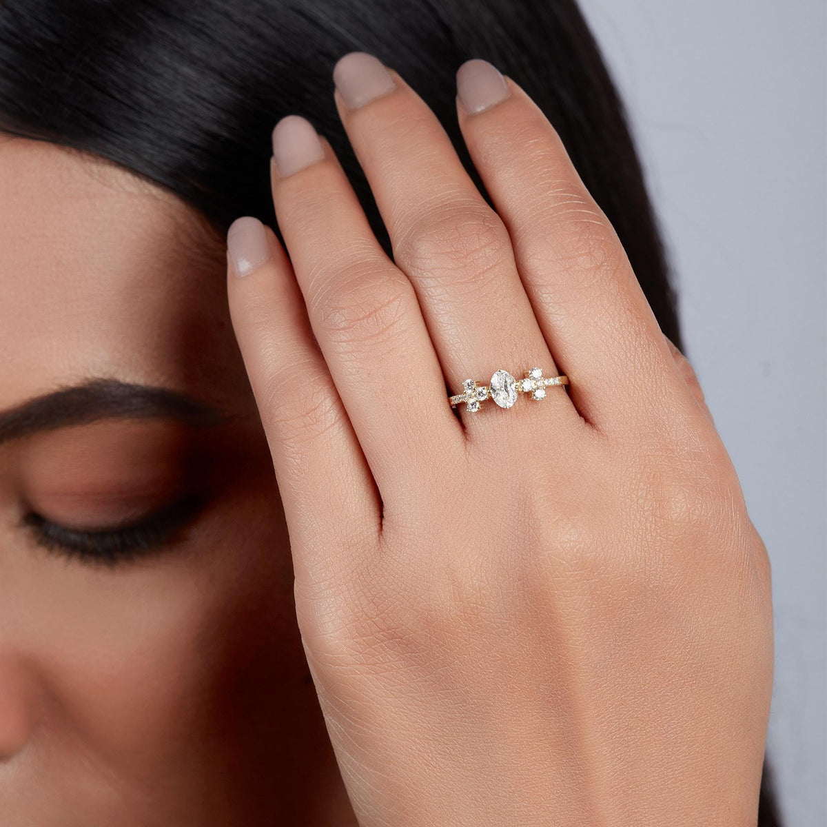 Elegant oval diamond statement ring styled as an index finger piece for everyday confidence