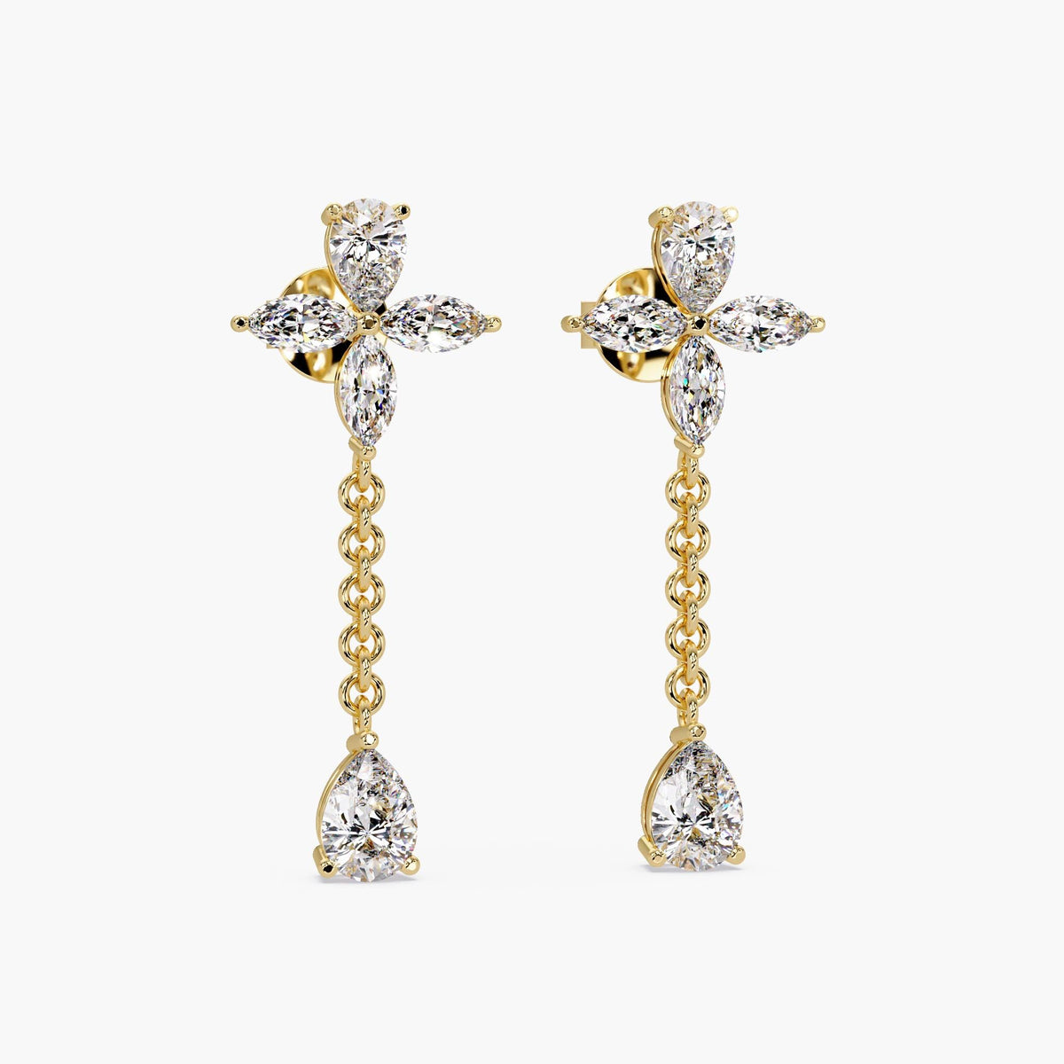 Floral marquise and pear diamond drop earrings in 14K yellow gold with dangling chain and teardrop diamonds