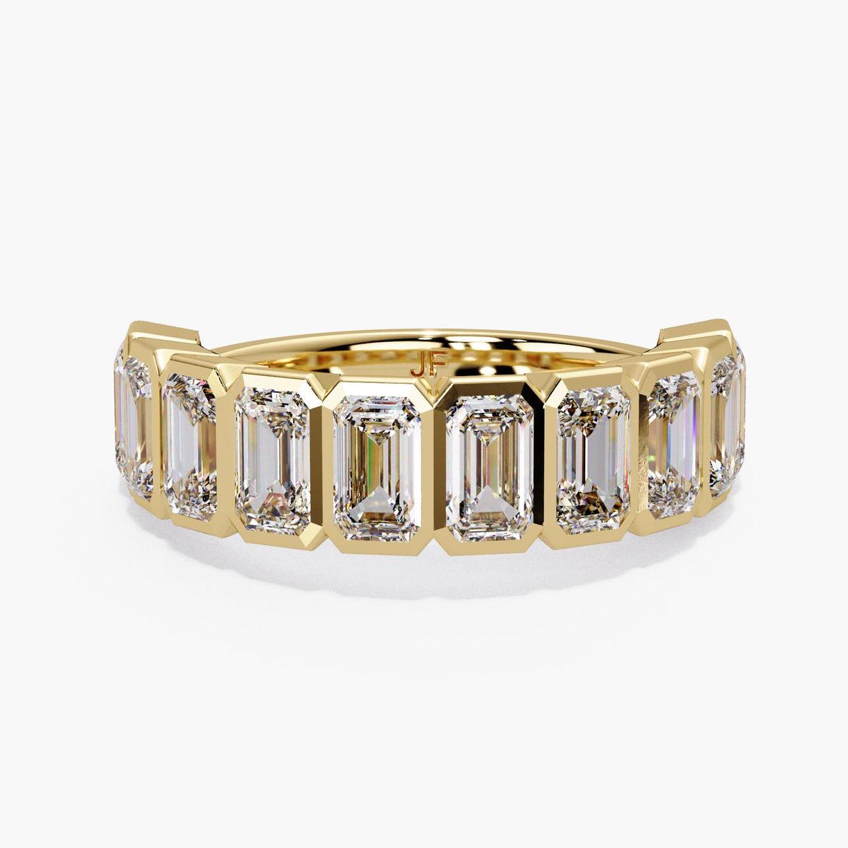 A sculptural emerald-cut diamond band designed to stand out with clean geometry and exceptional sparkle.
This 2.5+ CTW bezel-set half-eternity ring features ten 5×3 mm emerald-cut lab diamonds, each framed in a sleek, modern bezel for secure everyday wear.
Perfect as a wedding band, anniversary band, right-hand ring, or a bold stacking piece.