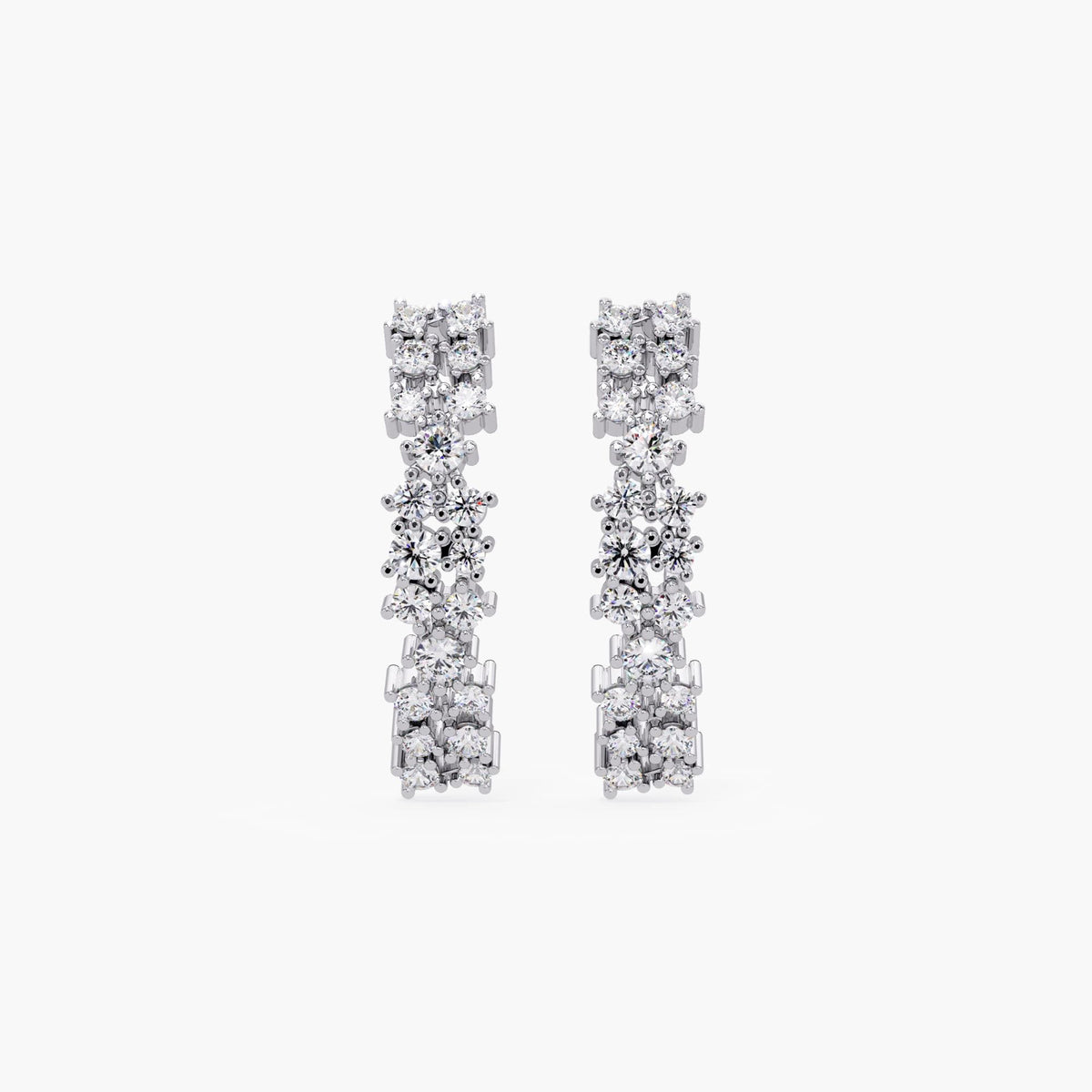 925 sterling silver diamond half hoop earrings with pushback post and prong-set diamonds.