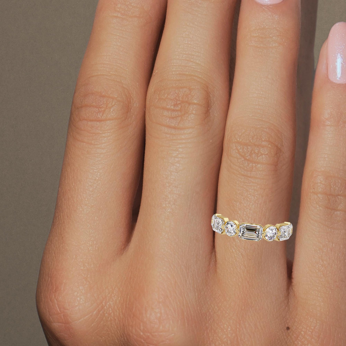 Mixed-shape 4 CTW lab diamond ring featuring emerald and round cuts in solid 14K gold