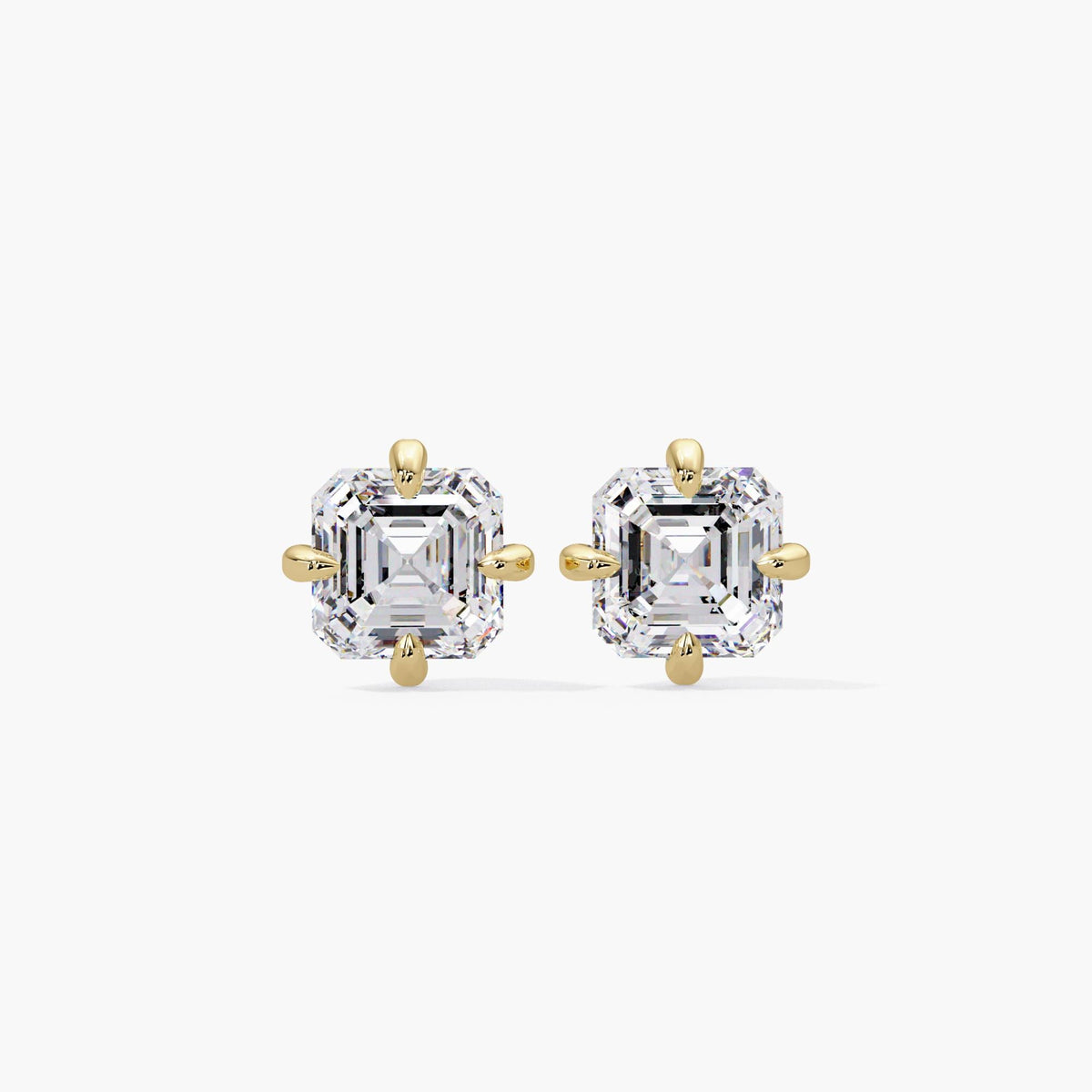 Asscher cut diamond stud earrings in 14k yellow gold