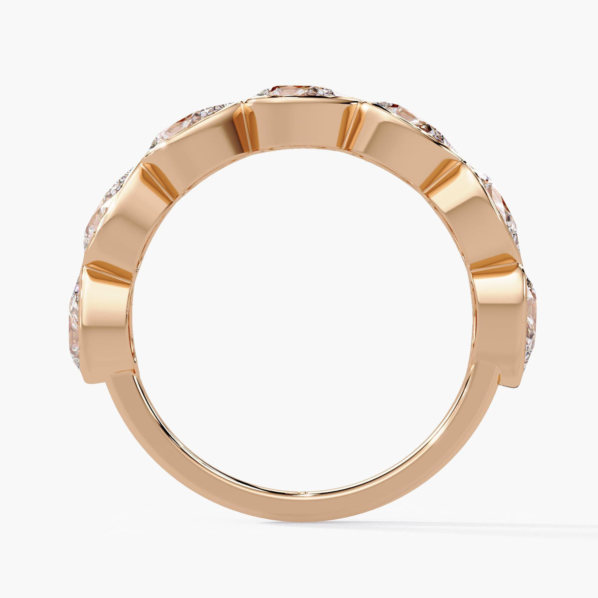 14K rose gold pear diamond bezel band with seven 5x3mm lab-grown diamonds set east-west in a 4mm half-eternity design.