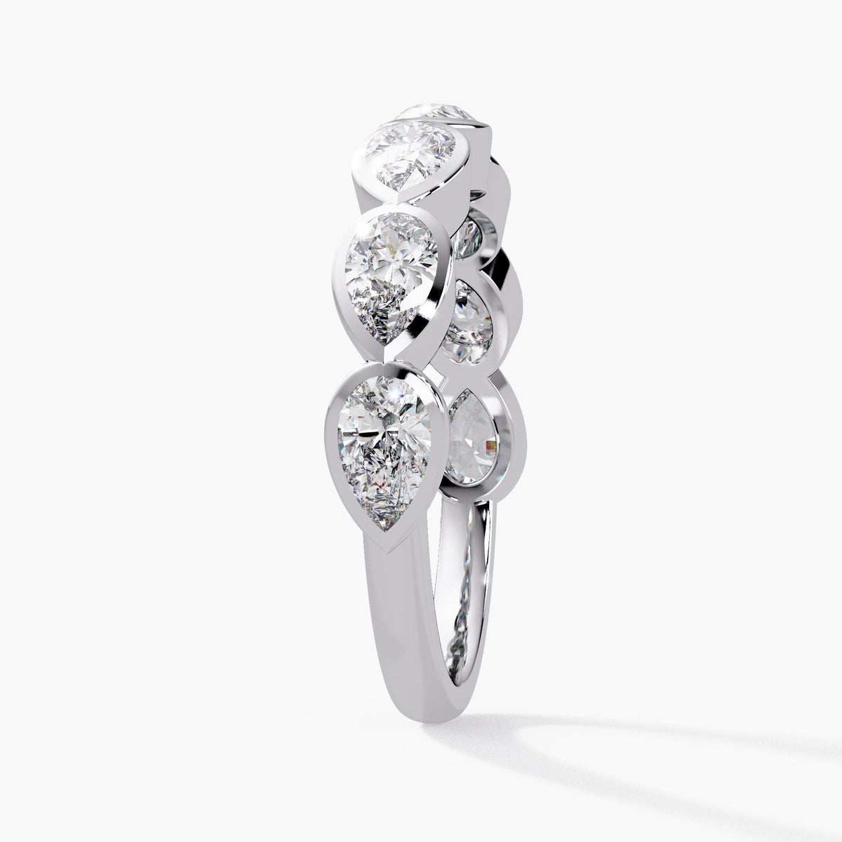 14K white gold pear diamond bezel band with seven 5x3mm lab-grown diamonds set east-west in a 4mm half-eternity design.
