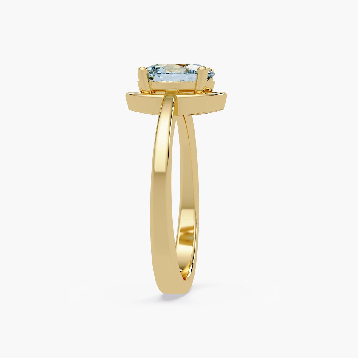 Oval sky blue topaz ring in 14K yellow gold highlighting the chunky half-bezel design.