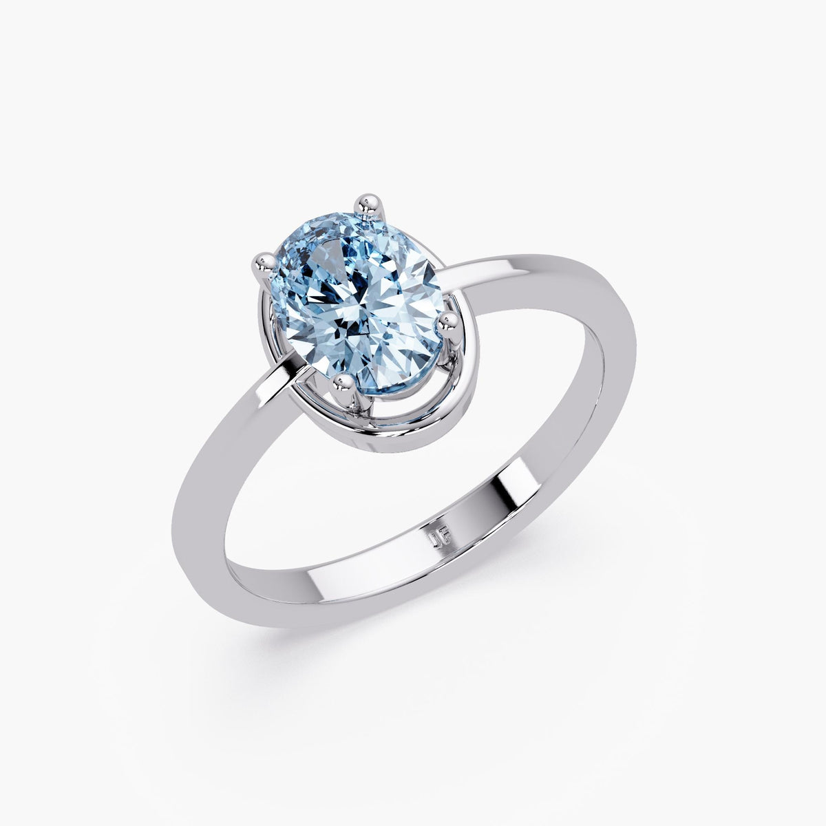 sky blue topaz solitaire ring in 14K yellow gold with half-bezel and prong setting