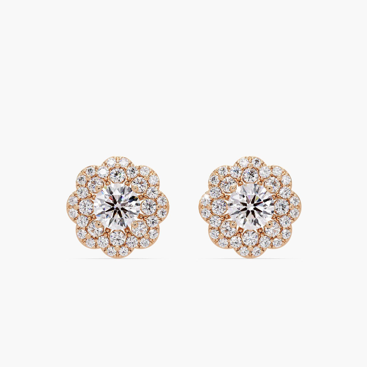 14K rose gold diamond flower stud earrings with a cluster design featuring a center round diamond surrounded by smaller pavé diamonds