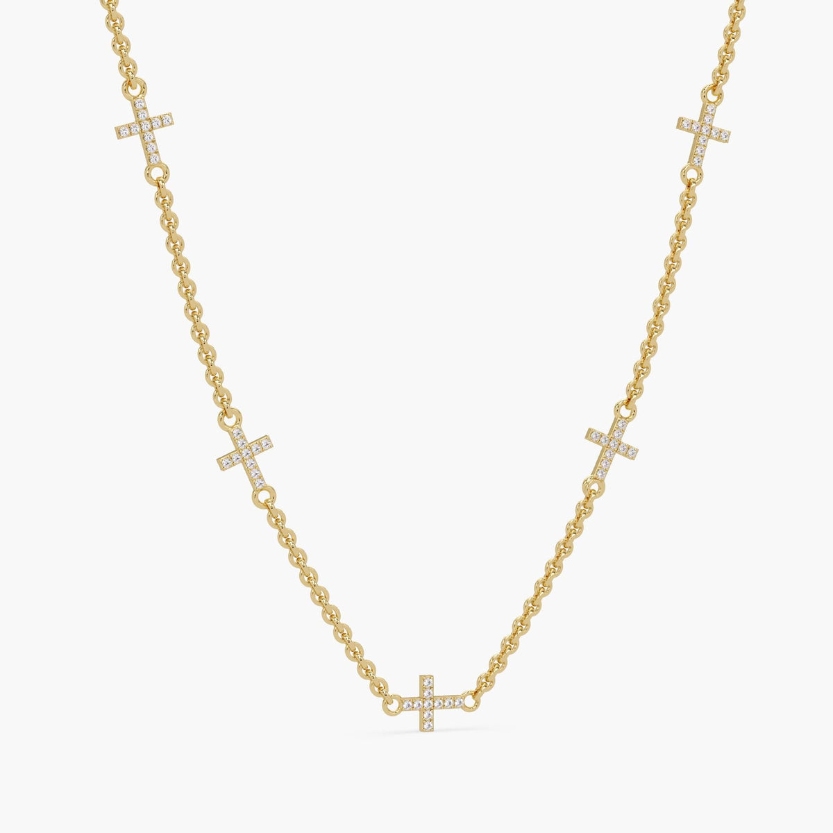 14K yellow gold diamond sideways cross necklace with five pavé-set natural diamond crosses on a delicate cable chain