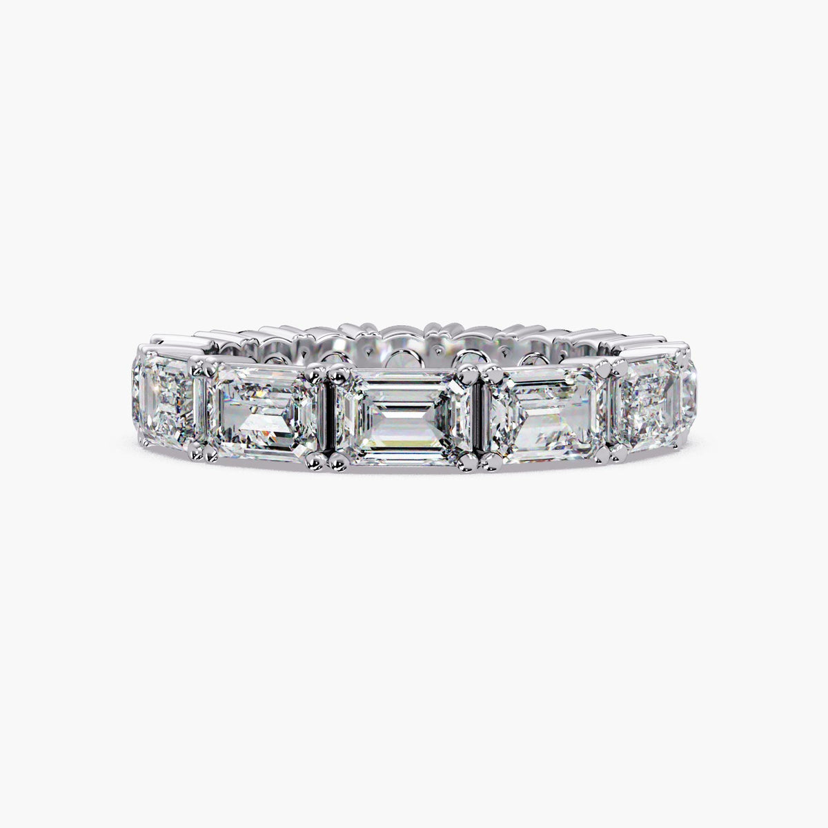 14K white gold eternity band featuring half emerald-cut and half round lab-grown diamonds in a full-eternity prong setting.