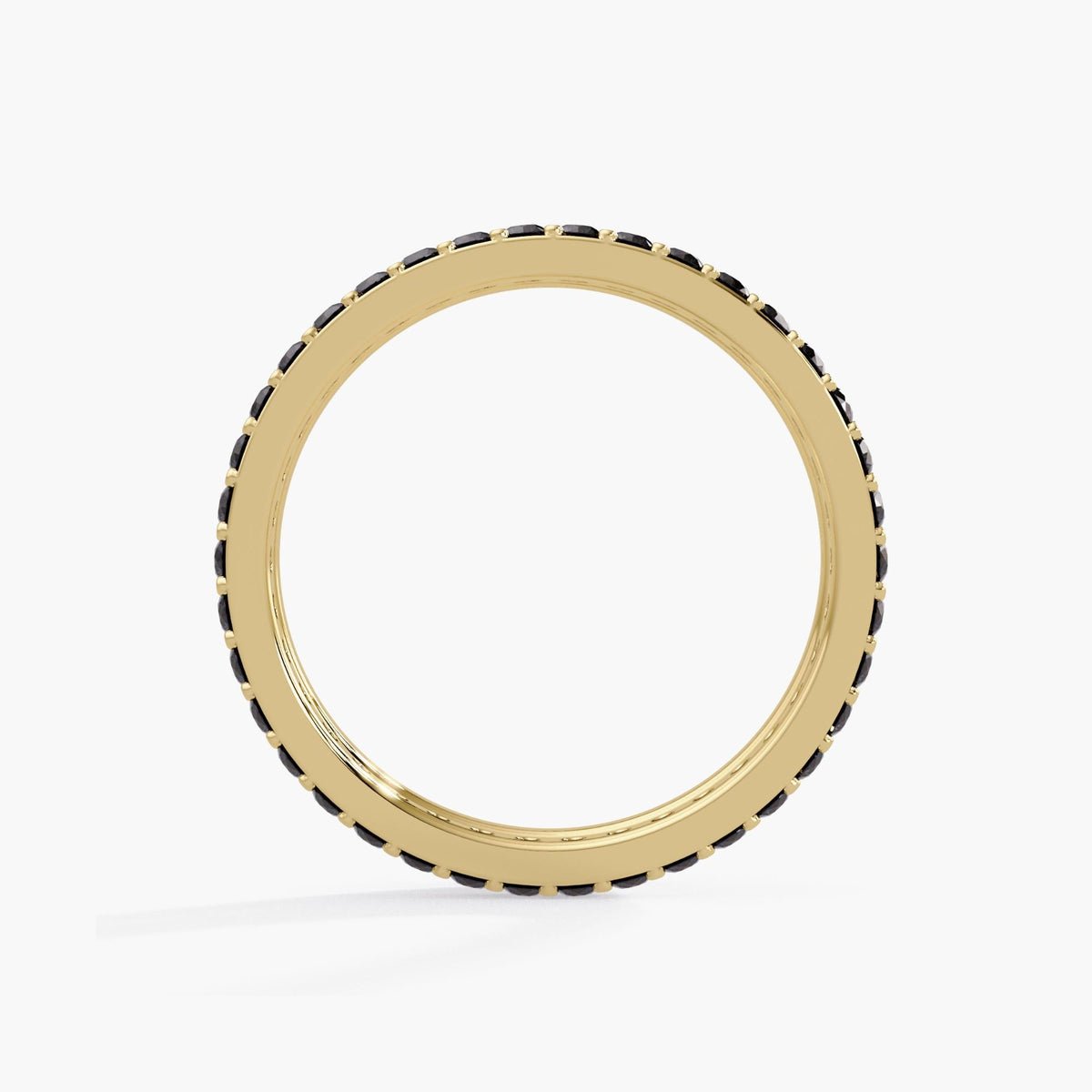 14K yellow gold rings: a stackable eternity band featuring 38 round-cut, natural black diamonds in a pave setting